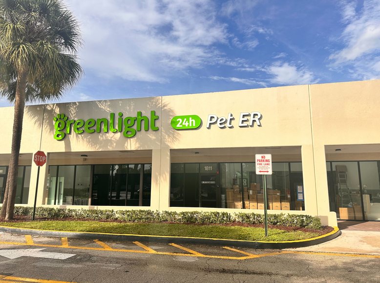 Front entrance and signage of Greenlight Pet ER Plantation at Jacaranda Square